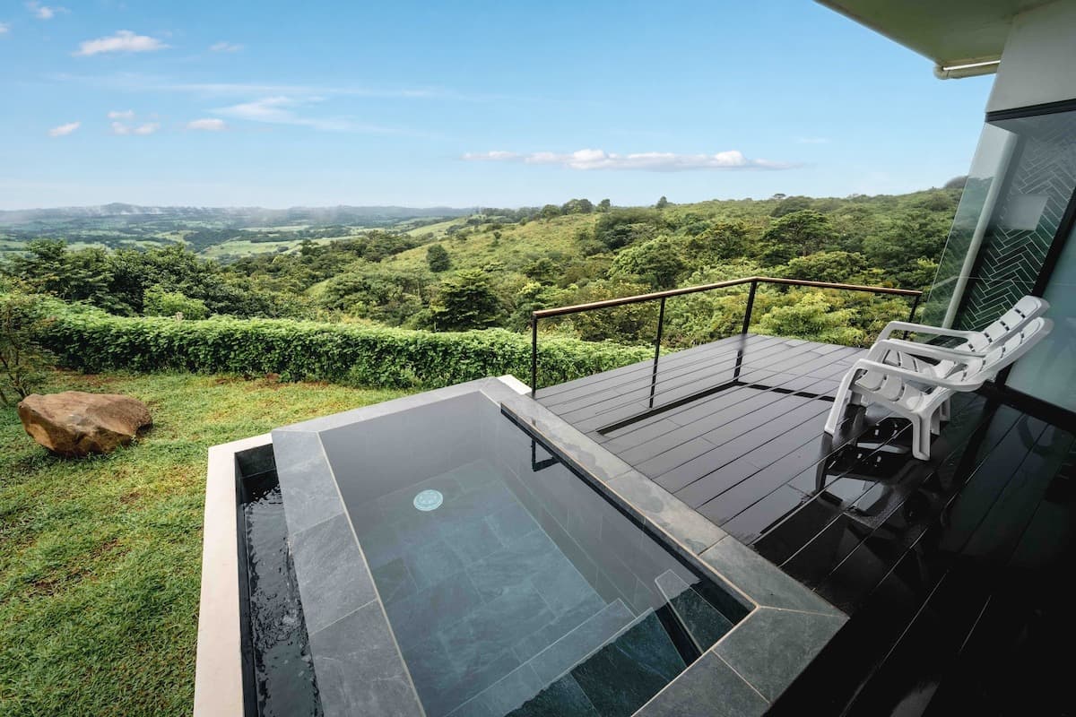 Plunge pool at the edge of the terrace, valley below